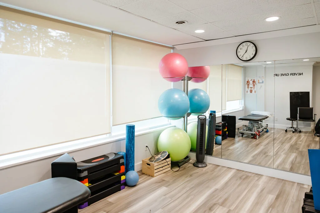 The specialized sports injury rehabilitation and physiotherapy gym setup featuring exercise equipment at Belmont Clinic.